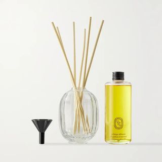 A reed diffuser from Diptyque