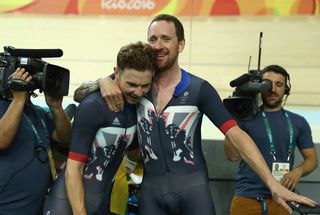 Bradley Wiggins (R) and Owain Doull (L) of Team Great Britain celebrates winning the gold medal after the Men's Team Pursuit Fina