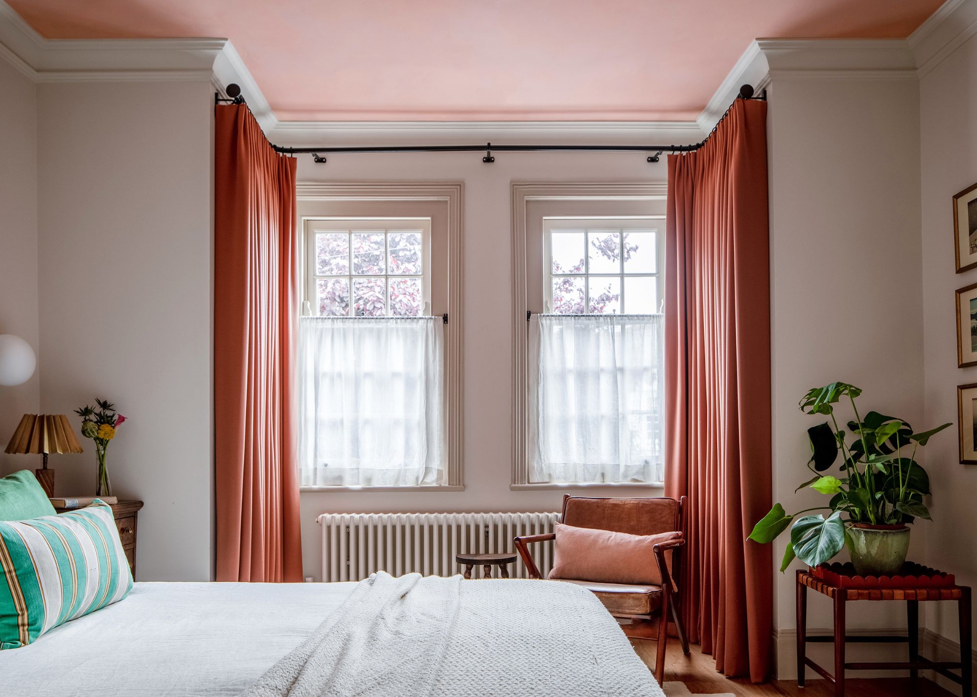 bedroom with red curtains