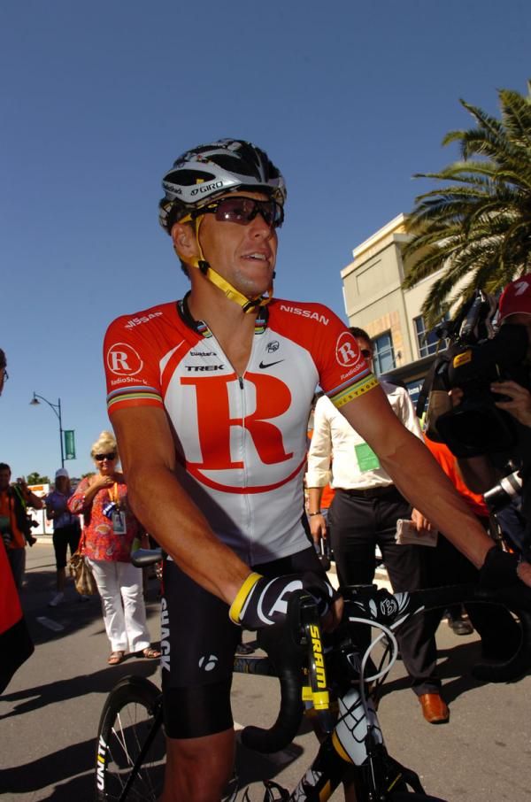 Lance Armstrong makes his way to the start