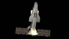 The new photo of Shenlong in space. It looks like a Space Shuttle with solar panels stuck on its bottom end
