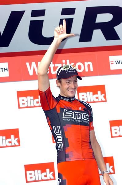Marcus Burghardt (BMC) waves to the crowd from the podium
