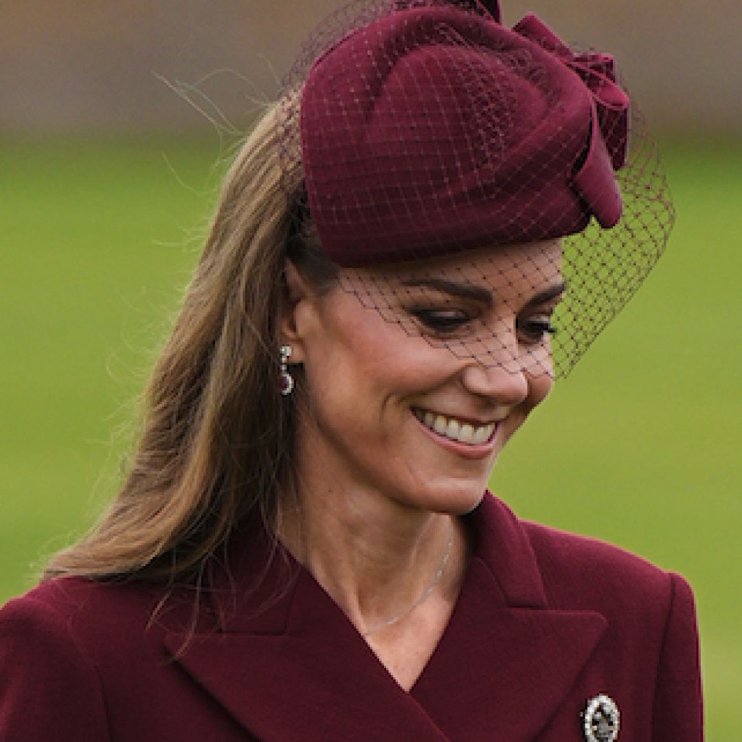 Kate Middleton wears a dark red coat dress with a matching hat and Princess Diana&#039;s Queen Alexandra Three-Feather Brooch