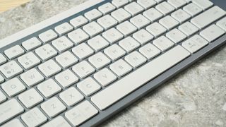 A white Logitech MX Keys S wireless keyboard for Windows and macOS