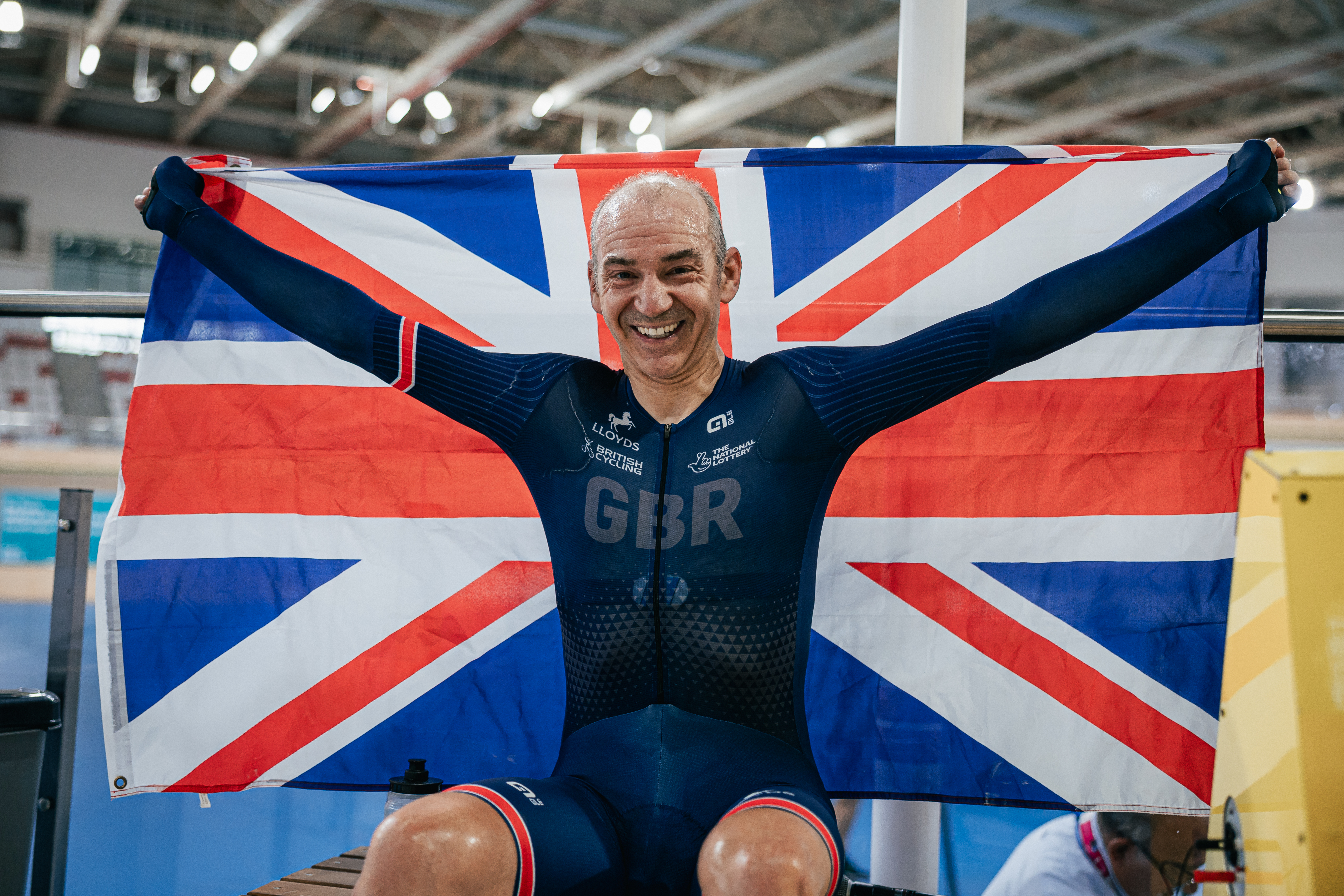 Will Bjergfelt of Great Britain celebrates after setting a world record breaking distance of 51.471km in the UCI Men’s C5 Hour Record category
