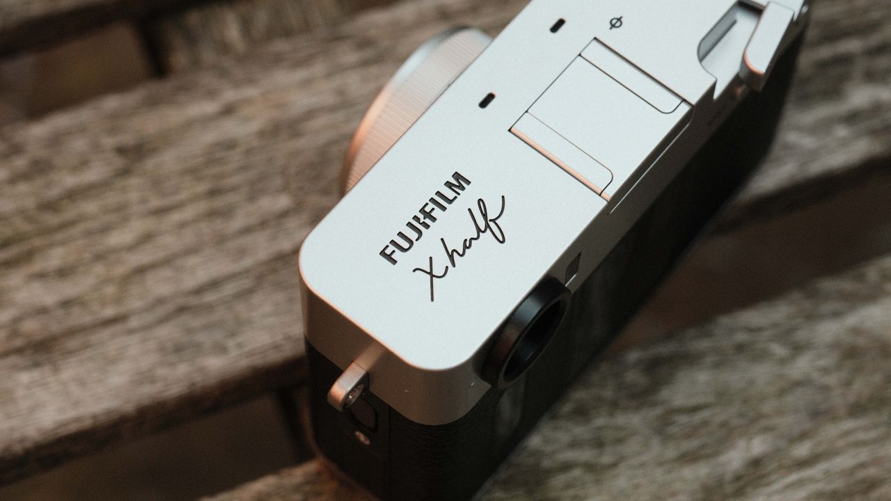 Fujifilm X Half camera on a wooden bench