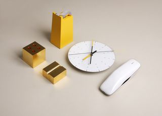 Wall clock, Gold-plated pen rest