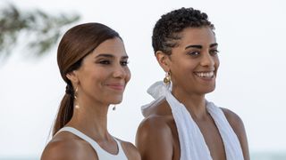 Roslyn Sanchez and Kiara Barnes standing in white in an episode of Fantasy Island on Fox