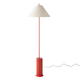 A red floor lamp