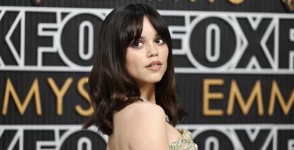 jenna ortega poses on the red carpet at the 2024 emmy awards