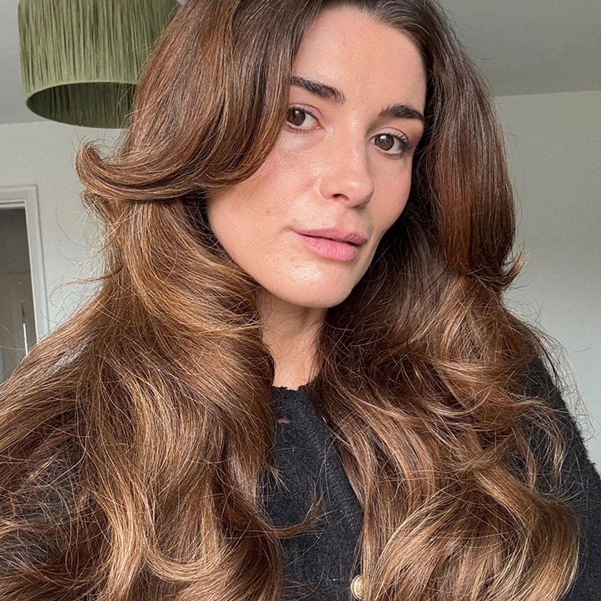 Selfie of beauty editor Eleanor's hair after using T3 Hair Rollers