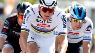 Mathieu van der Poel races in the UCI World Champion&#039;s rainbow striped jersey.