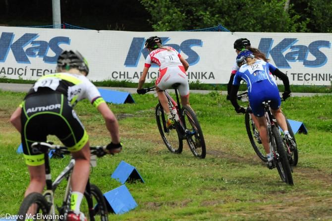 Katrin Leumann (Ghost Factory Team) leading her heat, as they are about to turn uphill