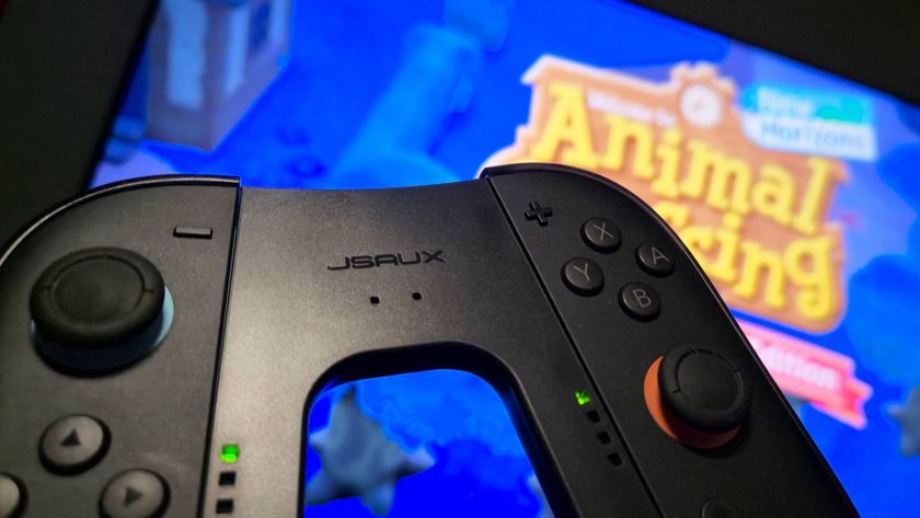 Image of the Jsaux Switch 2 grip being held up in front of a TV running Animal Crossing New Horizons Switch 2 Edition.