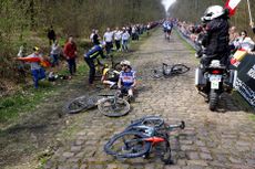 ROUBAIX, FRANCE - APRIL 09: (L-R) Kasper Asgreen of Denmark and Team Soudal - Quick Step and Dylan Van Baarle of The Netherlands and Team Jumbo-Visma after being involved in a crash during the 120th Paris-Roubaix 2023, Men's Elite a 256.6km one day race from Compiègne to Roubaix on / #UCIWT / April 09, 2023 in Roubaix, France. (Photo by Etienne Garnier - Pool/Getty Images)