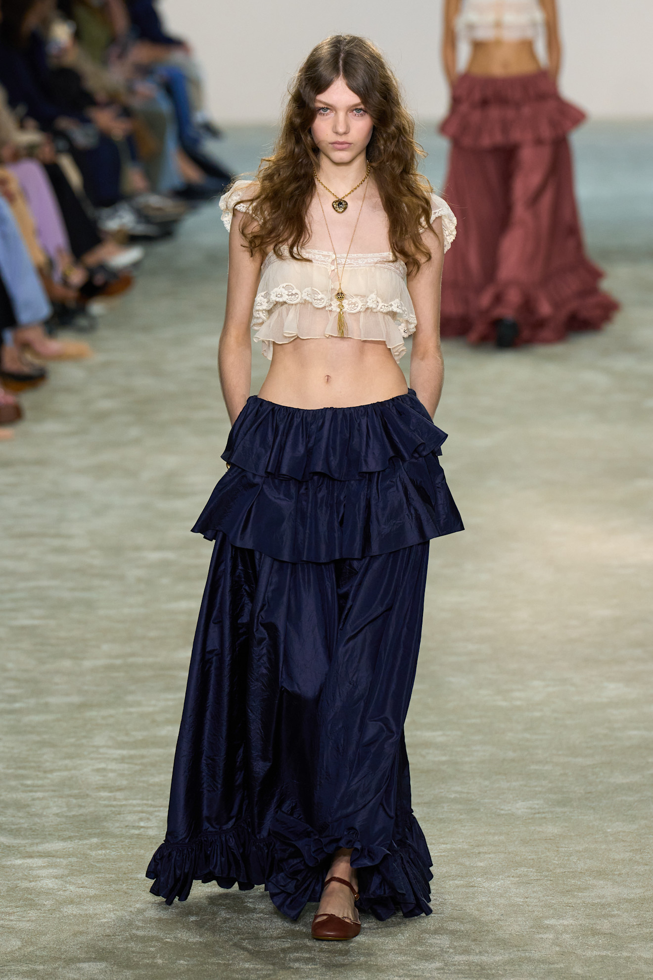 Chloe Fall/Winter 2025 AWomen wearing lace decorative tops and long skirts.