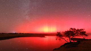 red sky created by northern lights