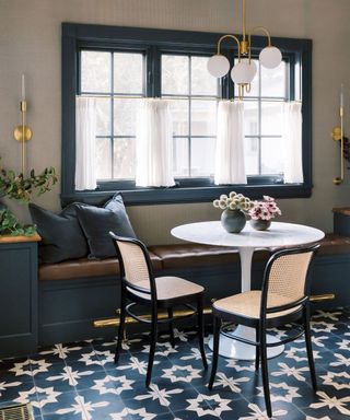navy blue breakfast or coffee nook with patterned floor tiles