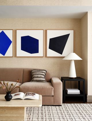 brown living room with blue art