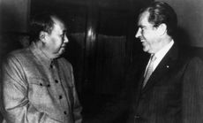 President Nixon shakes hands with Chinese communist leader Chairman Mao Zedong on Feb. 21, 1972.