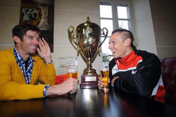 After a long season of racing, David Millar, left, and Philippe Gilbert kick back and enjoy a beer.