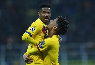 Ansu Fati celebrates with Jean-Clair Todibo after scoring for Barcelona against Inter in the Champions League in December 2019.