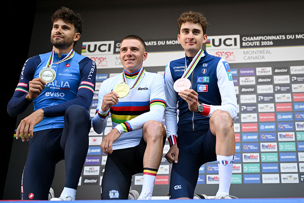 Men's podium (L to R): Second-placed Filippo Ganna of Italy, winner Remco Evenepoel of Belgium and third-placed Paul Seixas of France