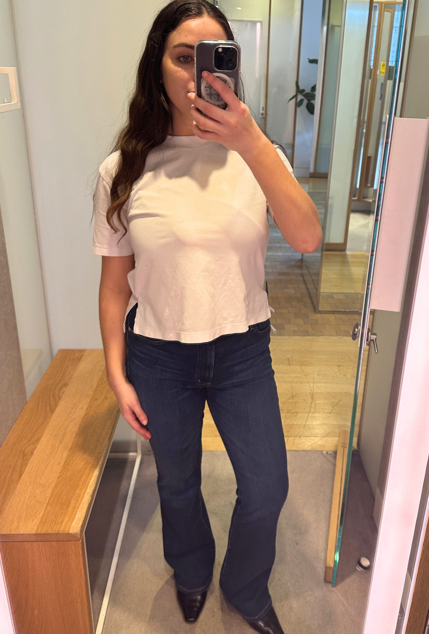 An image of Who What Wear UK SEO Writer, Ava Gilchrist, wearing Citizens of Humanity bootcut jeans.