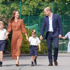 Prince George, Princess Charlotte and Prince Louis (C), accompanied by their parents the Prince William, Duke of Cambridge and Catherine, Duchess of Cambridge, arrive for a settling in afternoon at Lambrook School, near Ascot on September 7, 2022 in Bracknell, England. The family have set up home in Adelaide Cottage in Windsor's Home Park as their base after the Queen gave them permission to lease the four-bedroom Grade II listed home. 