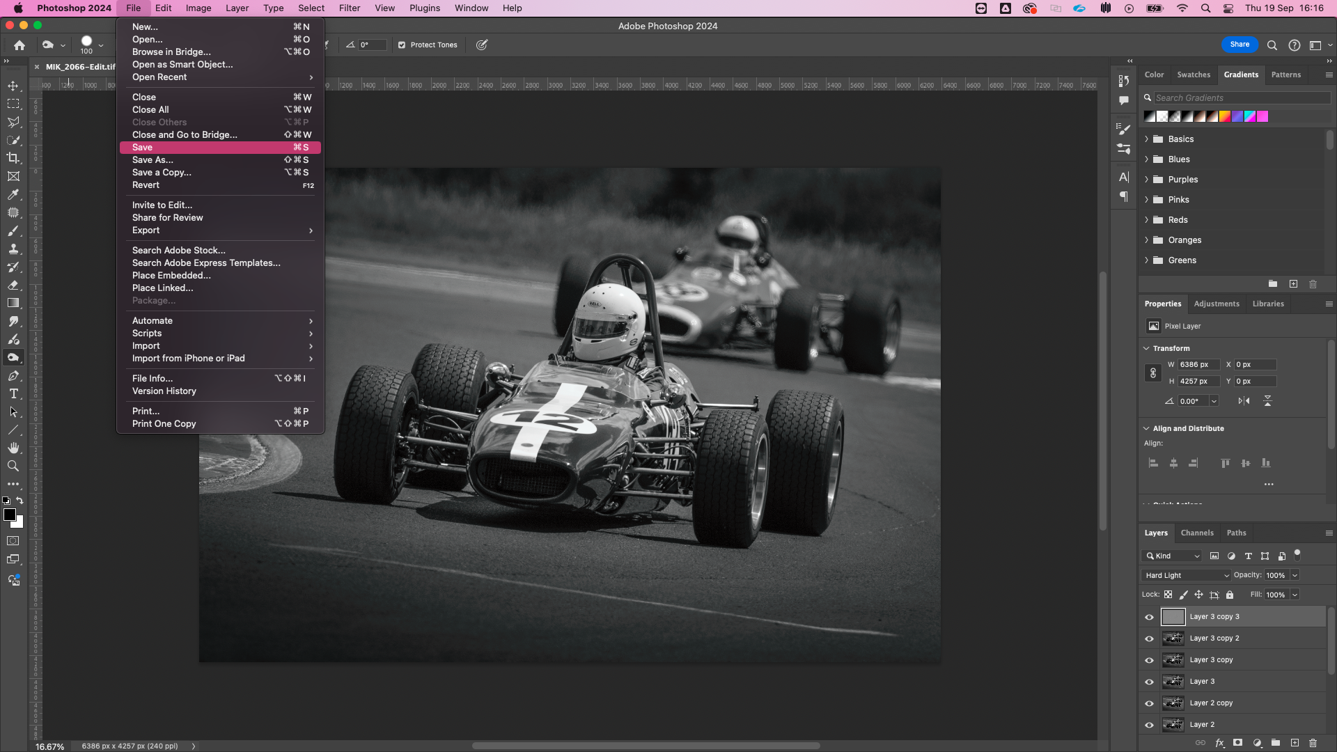 Photoshop CC screenshot showing a classic racing car in black and white