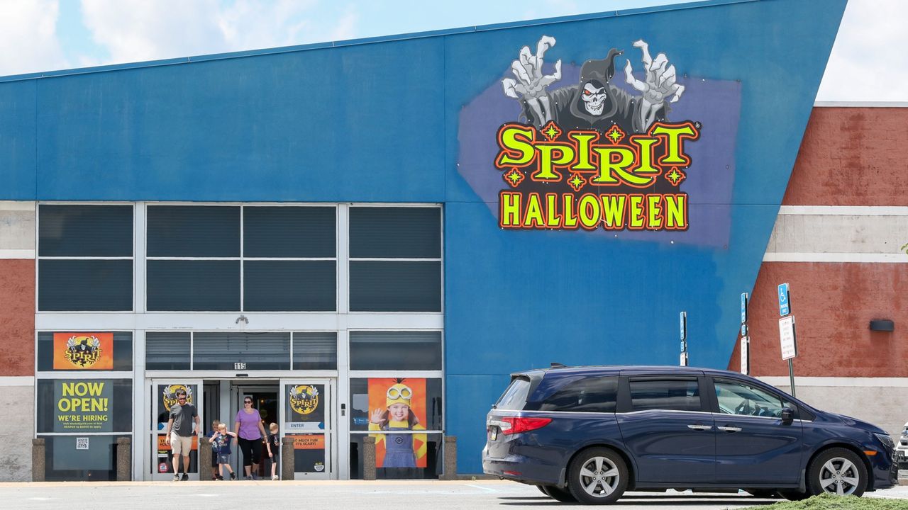 A family exits a Spirit Halloween store in Muncy, Pennsylvania.