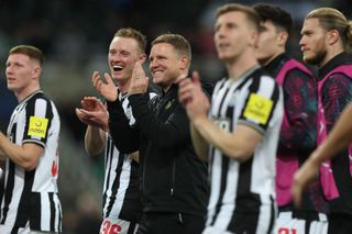 Newcastle United manager Eddie Howe and Sean Longstaff applaud their fans after their 4-1 win in the UEFA Champions League Group F match between Newcastle United and Paris St Germain at St. James's Park, Newcastle on Wednesday 4th October 2023