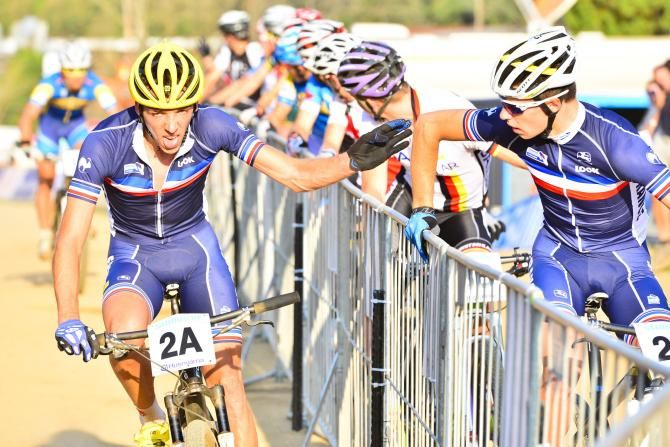 Jordan Sarrou of France completes his lap and tags a teammate
