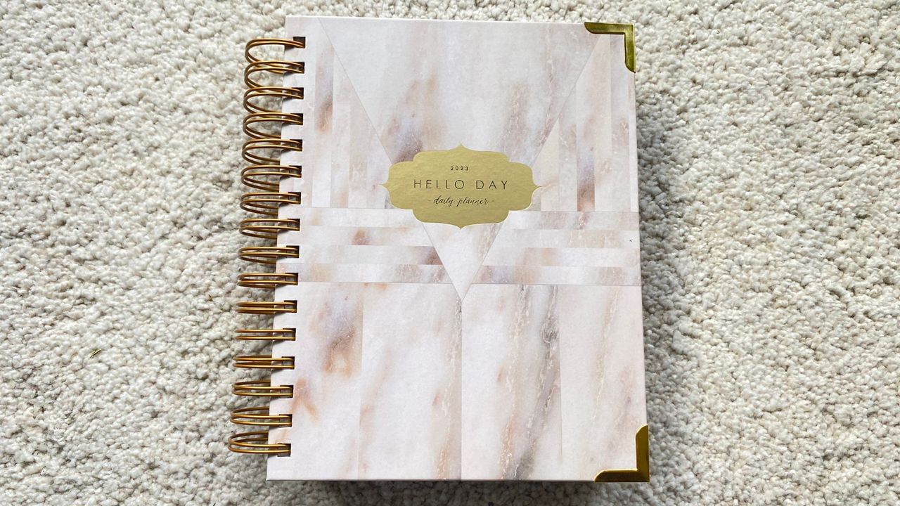 One of the best productivity planners we tested, the Hello Day Planner in Rosa.