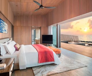 A A John Jacob Astor Estate King Suite Bedroom at Sunset at the St. Regis Maldives Vommuli Resort