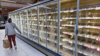 Empty shelves at a French supermarket following a cyberattack.