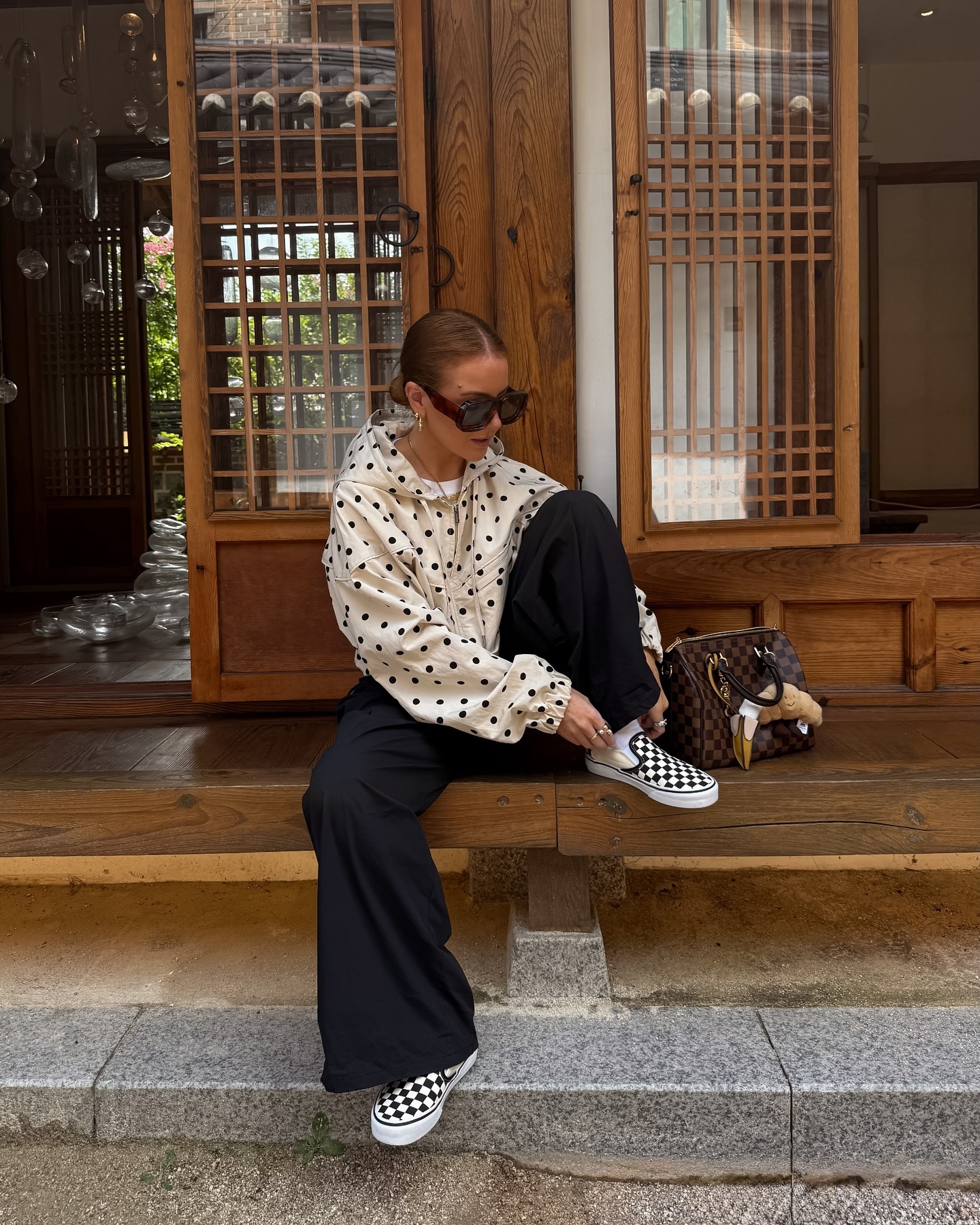 Fashion person Rebecca Ferraz-Wyatt wears colourful trainer outfits.