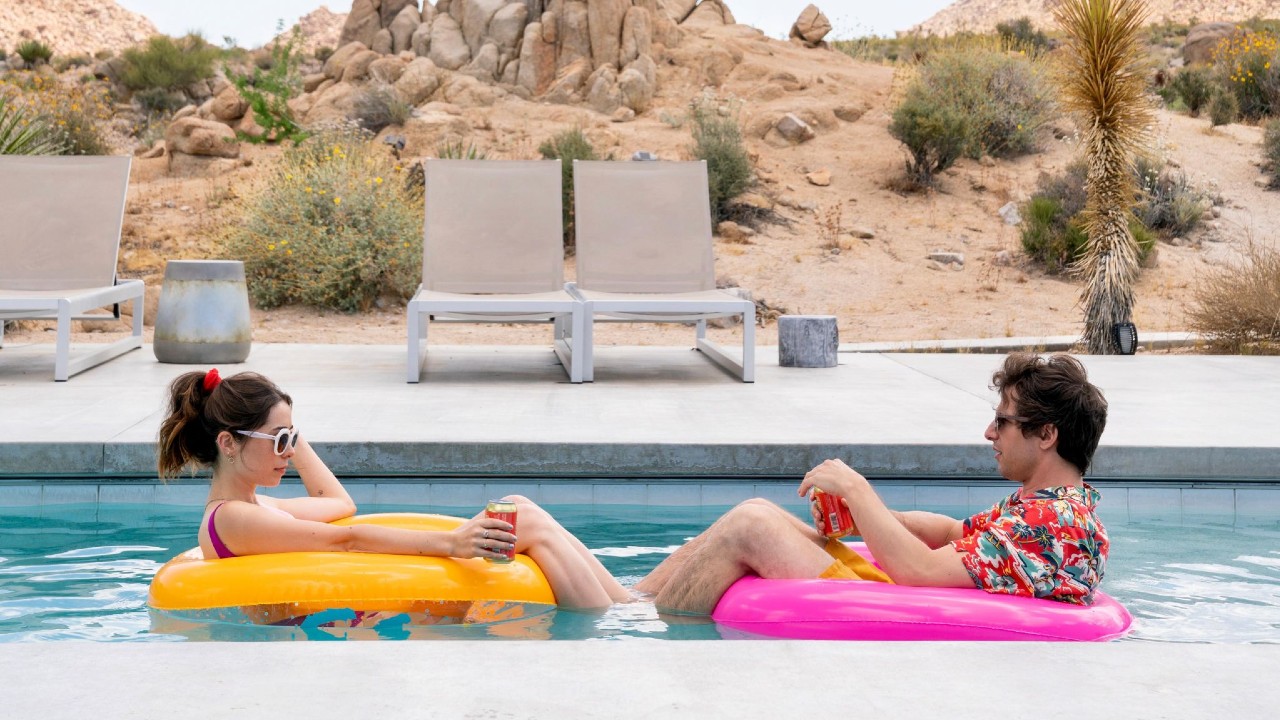 Cristin Milioti and Andy Samberg on a pool in a floaty in Palm Springs