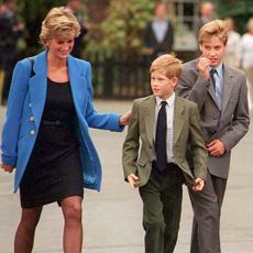 Prince William with Diana, Princess of Wales and Prince Harry on the day he joined Eton in September 1995. (Photo by Anwar Hussein/WireImage)