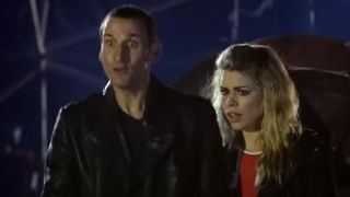 The 9th Doctor and Rose standing next to each other.