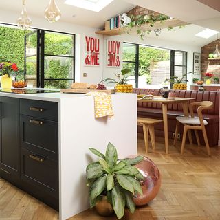 kitchen diner with island unit and pendant lights