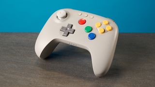 The 8BitDo 64 Controller against a blue background