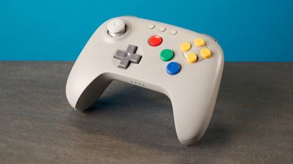 The 8BitDo 64 Controller against a blue background