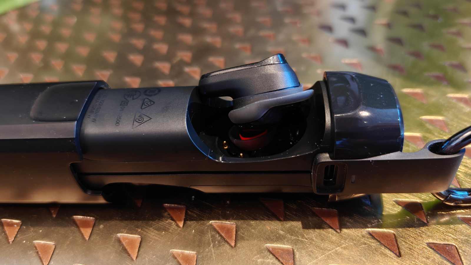 The Skullcandy Method 540 earbud, incorrectly placed in the carry case.