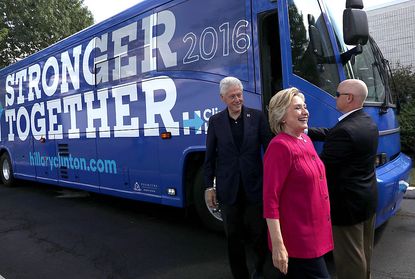 Hillary Clinton steps out of her campaign bus. 
