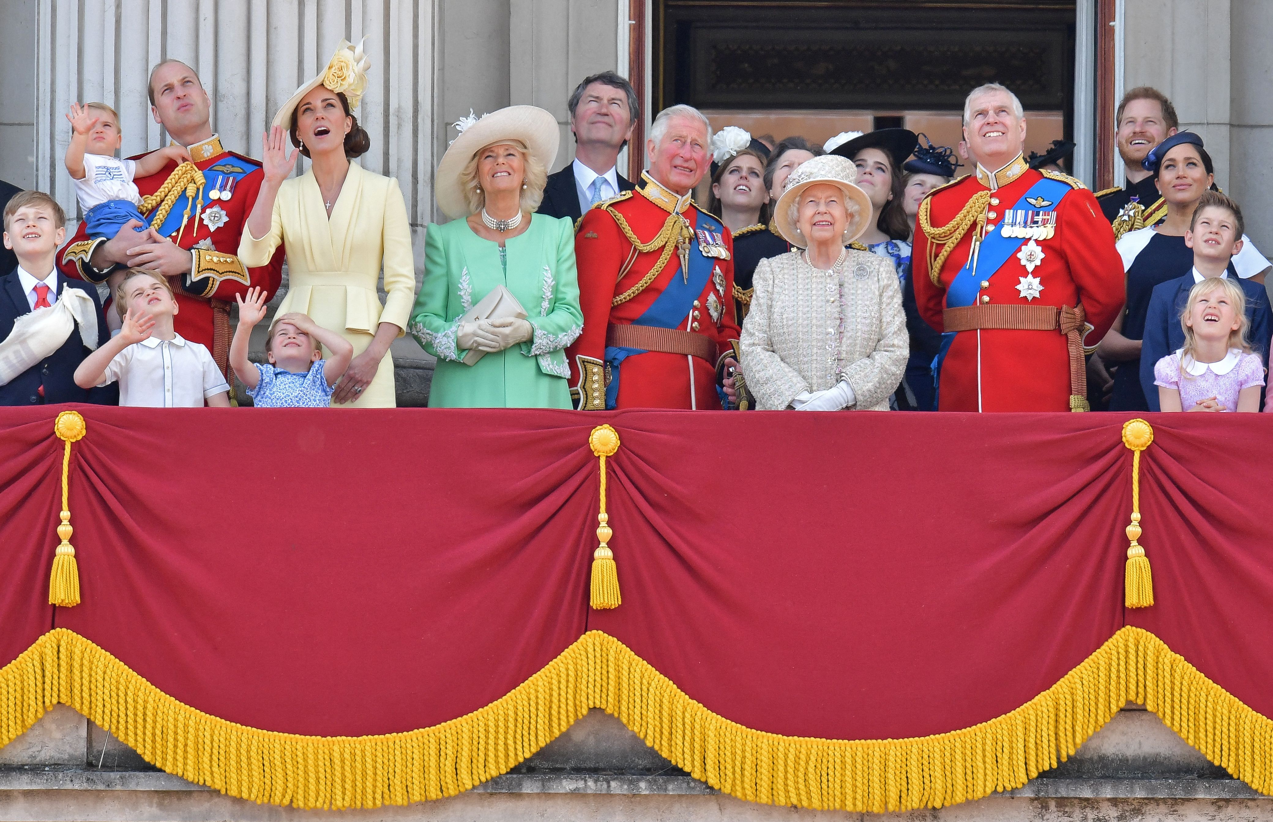 The Royal Family stand on the Buckingham Palace balcony