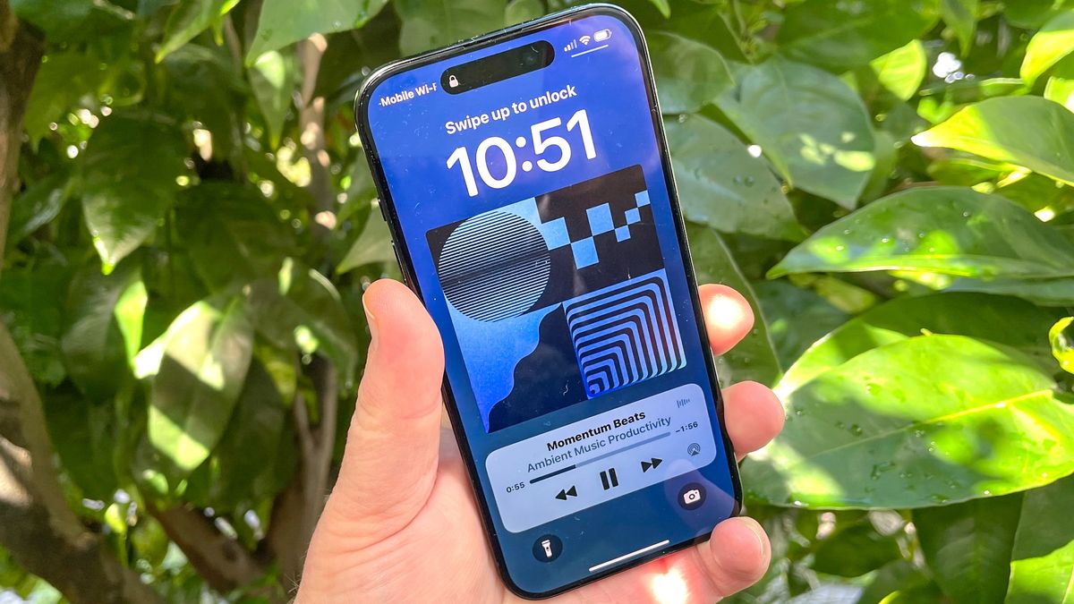 an iPhone 15 Pro playing ambient music in iOS 18.4