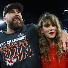 BALTIMORE, MARYLAND - JANUARY 28: Travis Kelce #87 of the Kansas City Chiefs (L) celebrates with Taylor Swift after defeating the Baltimore Ravens in the AFC Championship Game at M&T Bank Stadium on January 28, 2024 in Baltimore, Maryland. (Photo by Patrick Smith/Getty Images)