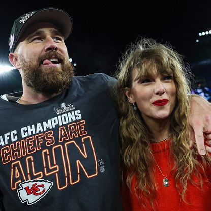 BALTIMORE, MARYLAND - JANUARY 28: Travis Kelce #87 of the Kansas City Chiefs (L) celebrates with Taylor Swift after defeating the Baltimore Ravens in the AFC Championship Game at M&T Bank Stadium on January 28, 2024 in Baltimore, Maryland. (Photo by Patrick Smith/Getty Images)