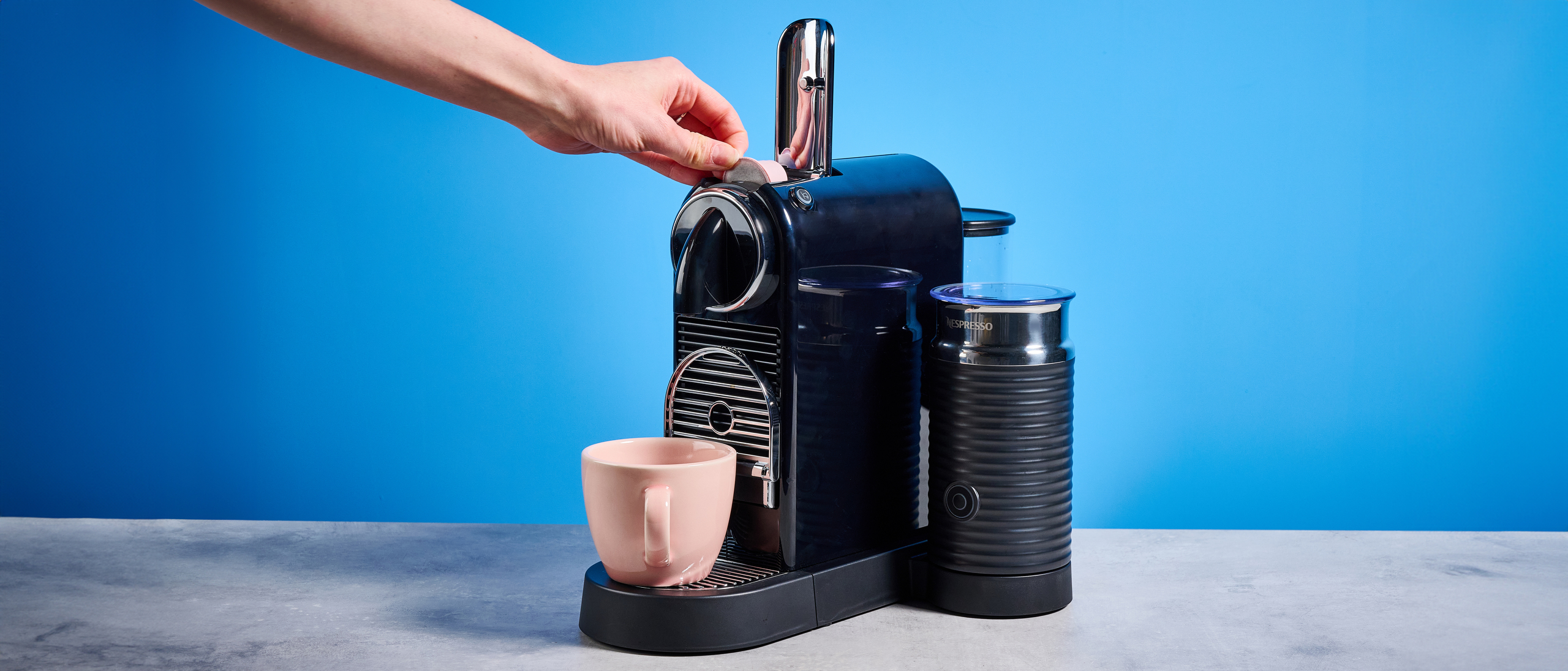 the nespreso citiz &amp; milk on the blue tom's guide background